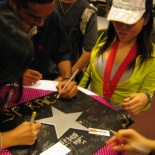 Signing of post event signature cards!