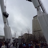 The London eye sits on these massive supports spanning over the broadwalk
