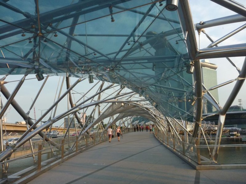 The bridge is cladded with mesh and translucent glass