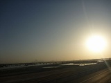 with the faint Abu Dhabi skyline in the distance