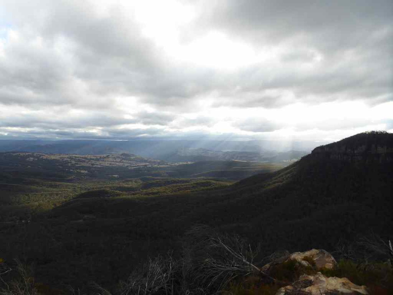 The vast valley with the continuous undulating forest below