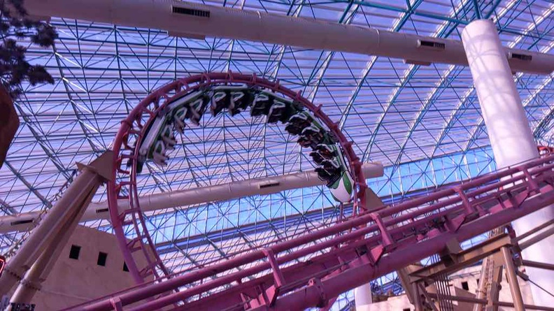 The Canyon blaster roller coaster doing one of its two loops
