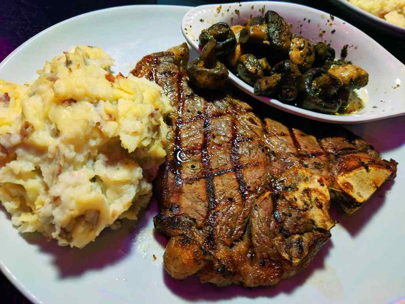 Their rib-eye steaks ($34) are really huge, served with potatoes and grilled mushrooms