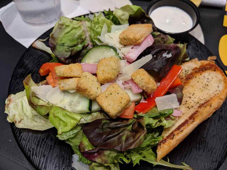 Servings of salads and breads come with your chicken. It makes for quite a wholesome meal