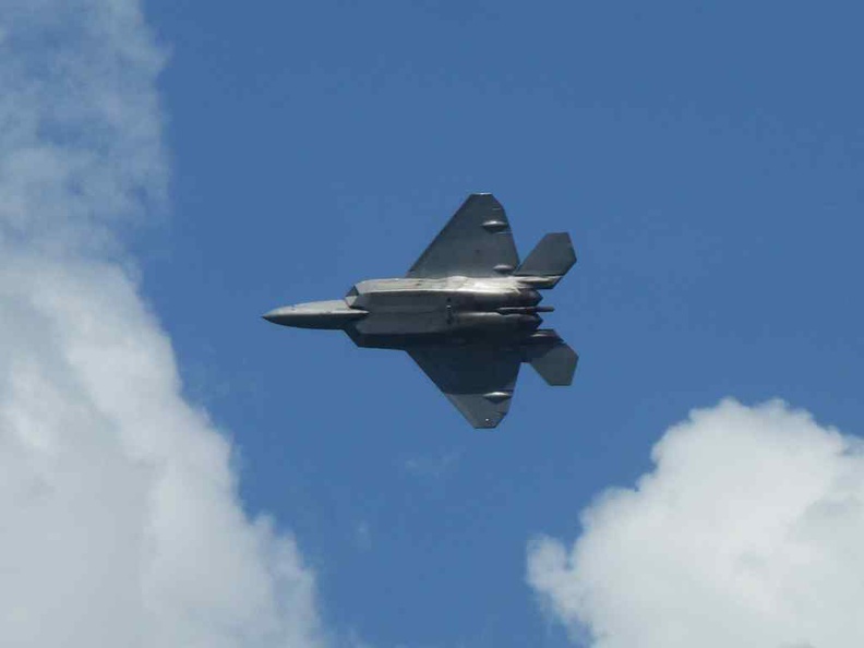 The F22 doing an undercarriage banked turn.