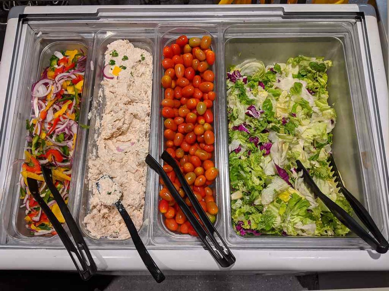 Fresh salad bar kept in chilled servers