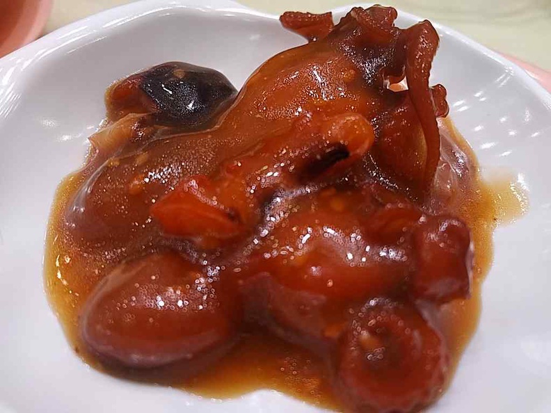 Servings of Tako baby octopuses in sauce. For those who desire their crunchy seafood fix