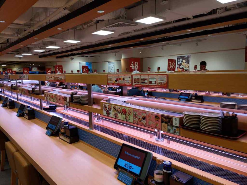 Yep, just like how a conveyor belt sushi place is, no frills here. It is the real deal