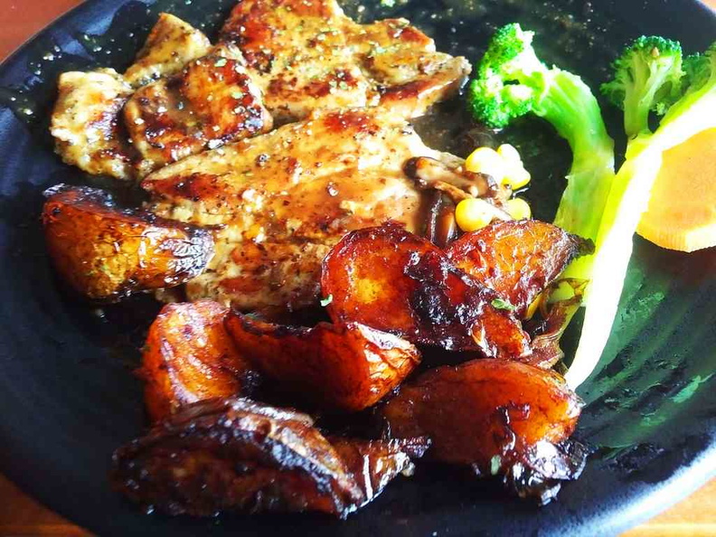 Pork Chop dish with vegetables and wedges