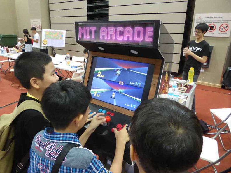 NYP with their retro-fied Arcade gaming machine, a hit with the kids