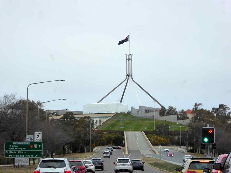 The Australian Parliament as seen from afar driving in towards Capital Hill