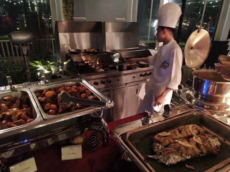 The open grill where you can see your food cooked by the hotel chefs behind the food counters. 