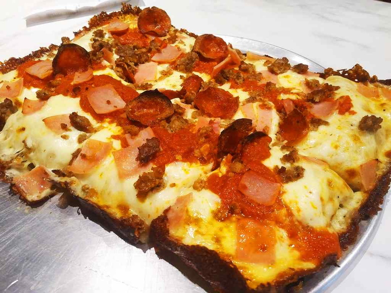 The rectangular meat lovers deep dish pizza. It is not as deep as expected, but makes up for it with taste and an addictively Crispy outer crust