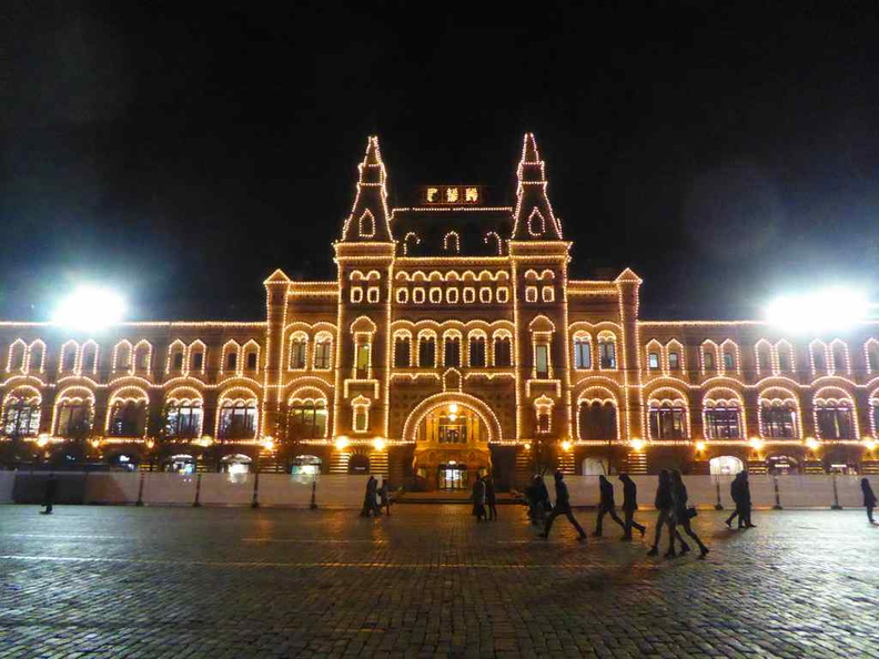 The front of the mall, lit at night from the red square