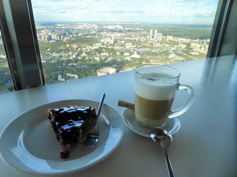 Enjoying the views on the revolving cafe with freshly-made coffee and cheesecake