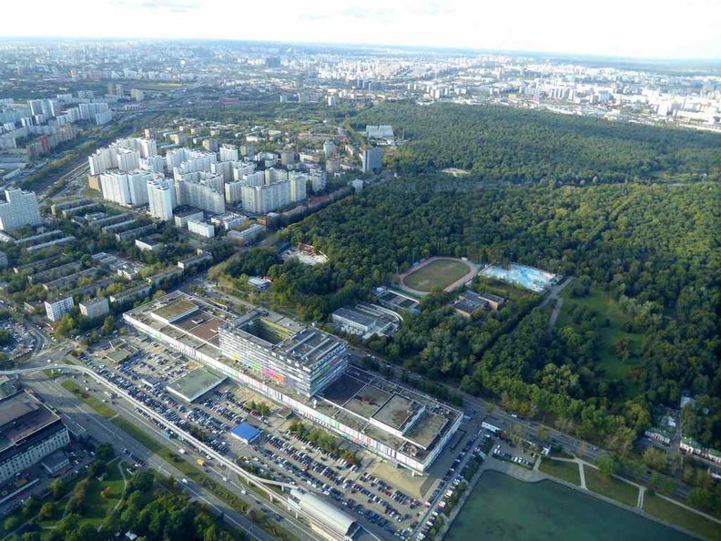 The TV station, monorail station and adjacent reservoir. Notably, it is surrounded by alot of green among the neighborhood buildings