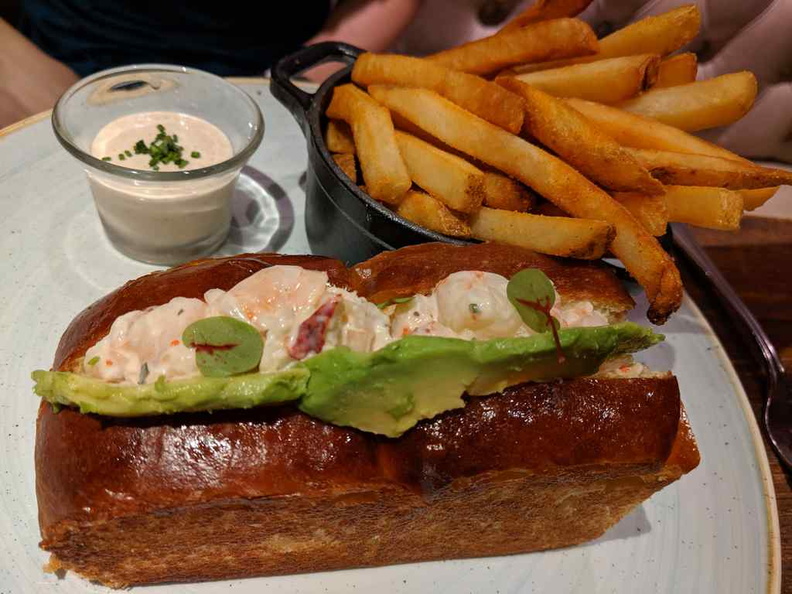Lobster and Shrimp bread roll, served with a bed of fries