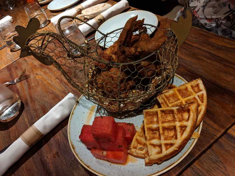 Yardbird Signature fired chicken and Watermelon and Waffles ($40). It is essentially a southern-style fried chicken platter