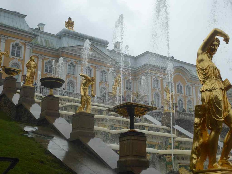 The grand cascade and the lines of golden sculptures placed along the slope