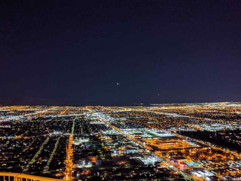 Sparkles of distant planes landing and taking off from Las Vegas international Airport from the STRAT observation tower