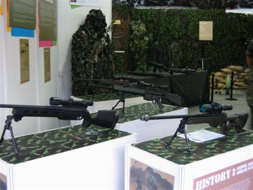 some cool lookin' sniper rifles on display.