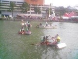 Racing untested hand made rafts can be a challenge in the river