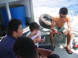 boat atf's playing tai-tee to the maxes! got cards can play, anywhere! haven't tried underwater thou...