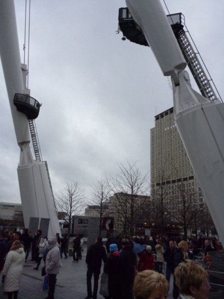 The London eye sits on these massive supports spanning over the broadwalk