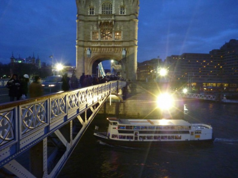 Boat traffic is moderate on the thames.
