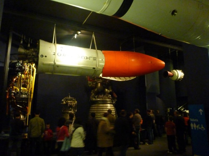 There are many rocket and satellites on display