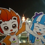 The youth olympic mascots and the flame
