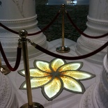 between each pillar structure sits a rather neat looking stained glass flower