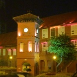 The clock tower lit at night