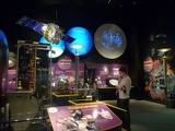 various space telescopes and probes on display