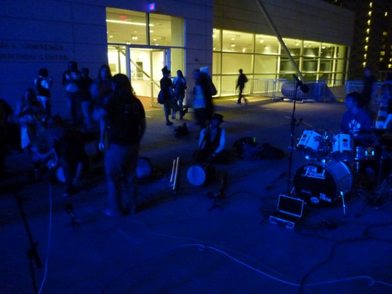 A percussion group playing on the roof