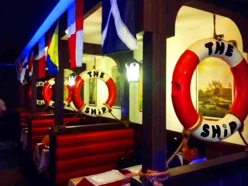 The booth seating maritime theming of the Ship Restaurant