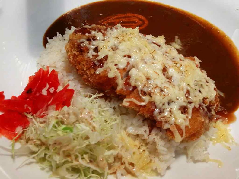 Your Coco Curry Ichibanya cutlet rice served with generous servings of shredded lettuce.