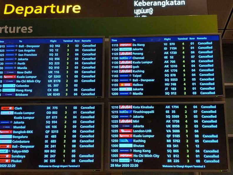 Changi Airport Covid-19 Boards of cancellations is common here in all terminals