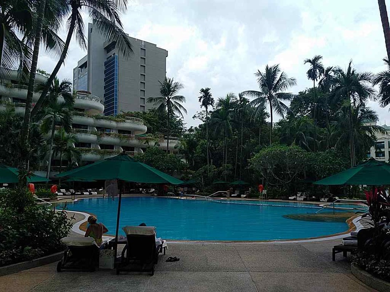 The pool are of the hotel, which the buffet area looks out upon