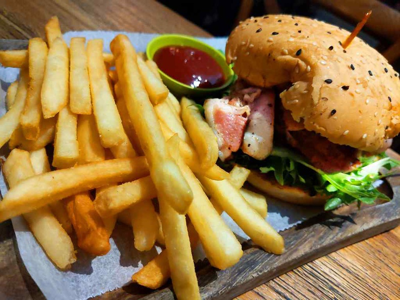 All their burgers come with BBQ sauce, salad, pickles, sitting between sesame buns and served with fries as sides