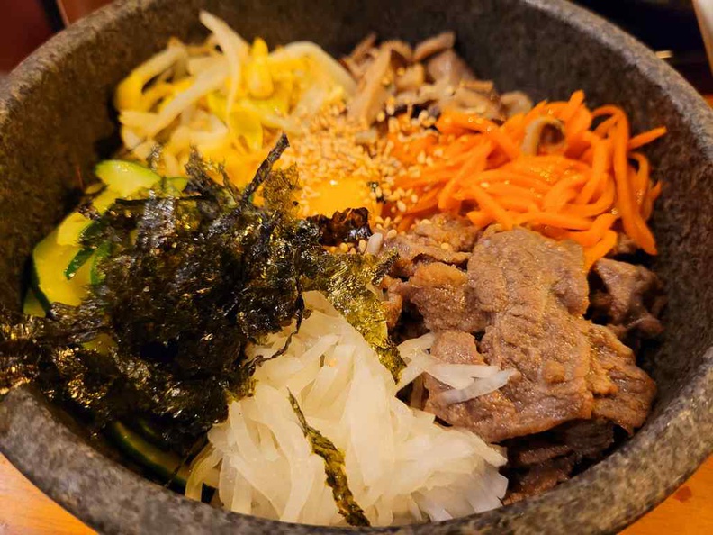 Wonderful Bap Seng Bimbimbap ($12.80) a potpourri mix of hearty meat and vegetables ingredients in a heated hotstone bowl