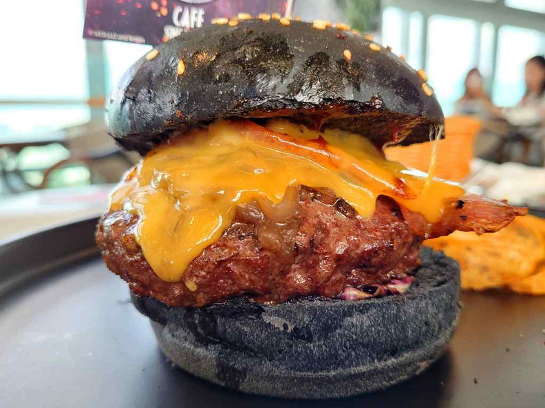 Jurassic World Cafe Ion Sky Jurassic World Burger ($28) is one of the better meal offerings, served with wedges