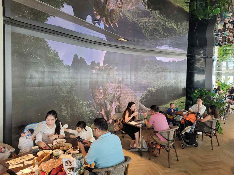 Jurassic World Cafe Ion Sky Dining area with the ambient static dinosaur background