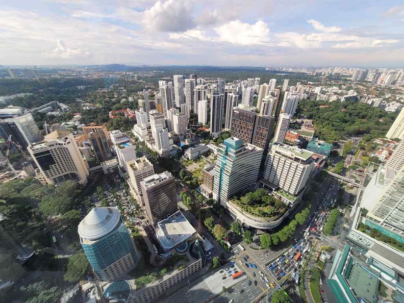 Bukit Batok hill and Malaysian ridgeline in the distance from Ion Sky