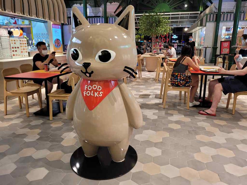 Welcome to Food Folks Lau Pa Sat, with their cat mascot