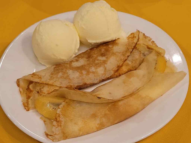 Fancy Pancake ($14) is a caramelised banana dessert, brushed with freshly whipped cream and wrapped in homemade crêpe, served with ice cream