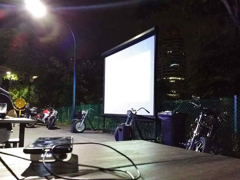 Outdoor screening projection in their rather dark outdoor dining areas