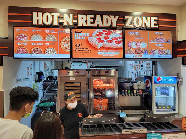 The ordering counter at Little Caesars Funan