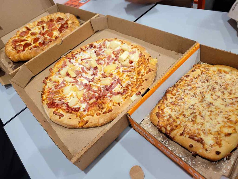 Spread of pizzas