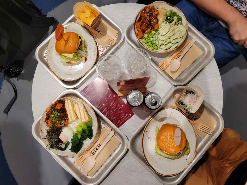 You dishes at pink fish changi jewel are served on small neat metal trays with sustainable cutlery